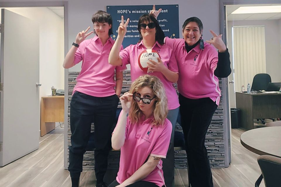 HOPE staff wearing pink planning team t-shirts by Gadar.